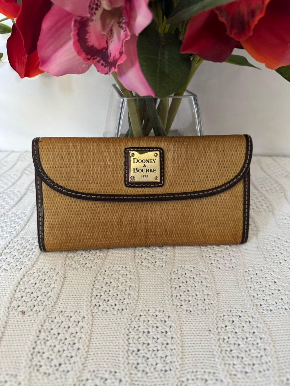 Dooney & Bourke embossed woven leather wallet